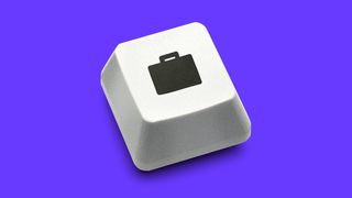 An example of a single keyboard key with a bag icon on it. 
